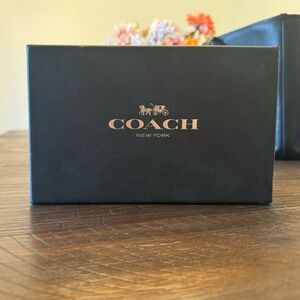 COACH star glitter wristlet midnight blue